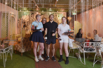A Melbourne favourite, Madame Brussels, was a COVID victim, closing its doors for good.  Paula Scholes, aka Miss Pearls (second left) with staff Ebony, Nick and Holly.