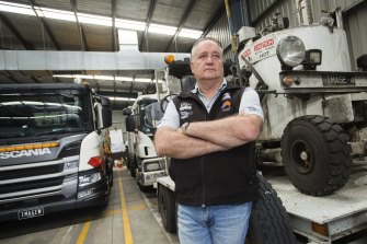 Linemarker Craig Riley is one of the business owners who is owed money after a builder on the Western Roads project went bust.