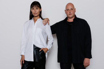 Designer Michael Lo Sordo and a model wearing his white shirt for Witchery, with 100 per cent of proceeds raising money for the Ovarian Cancer Research Foundation.