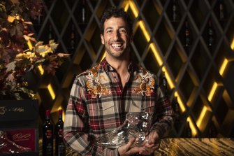 Daniel Ricciardo spruiks his commercial deal with St Hugo wines at the W Hotel in Melbourne on Monday. The F1 driver says he prefers red wine over the traditional F1 champagne.