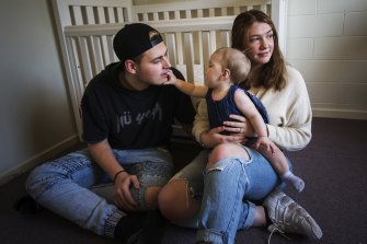 Destiny Axten Sarpa (right), her partner Gage Potter and 9-month-old daughter Winnie, have flourished after finding secure accommodation. 