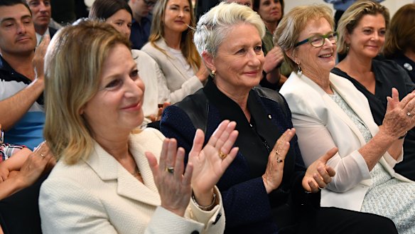 Things are getting personal on the campaign trail for Federal Member for Wentworth, Independent Kerryn Phelps,(centre), and her wife, Jackie Stricker-Phelps (left).