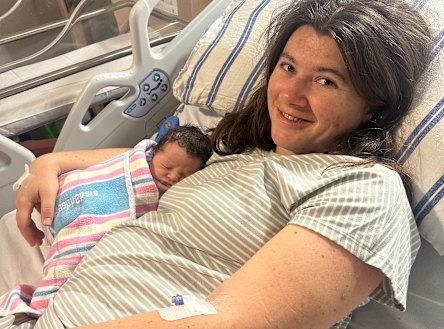 Baby delivered: Bethany Williams with her newborn child. “Even with an epidural to mitigate the pain, pushing my baby out was the hardest thing I have ever accomplished.” 