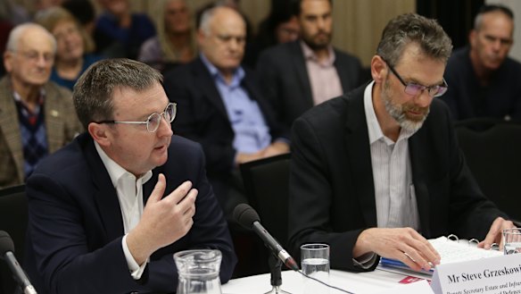 Defence officials Chris Birrer and Steve Grzeskowiak are grilled at a parliamentary inquiry into PFAS contamination in Williamtown, north of Newcastle. 