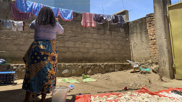 Reby, outside her home in Beni, eastern Congo, says she was told: “You are a big girl and if you sleep with me, you are going to be a high-ranking member of the Ebola response in Beni and you are going to receive around $US800 a month.” She refused.
