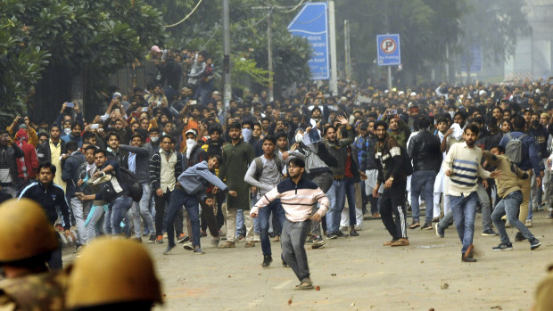 Students protest outside Jamia Millia Islamia University in Delhi.
