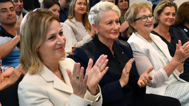 Things are getting personal on the campaign trail for Federal Member for Wentworth, Independent Kerryn Phelps,(centre), and her wife, Jackie Stricker-Phelps (left).