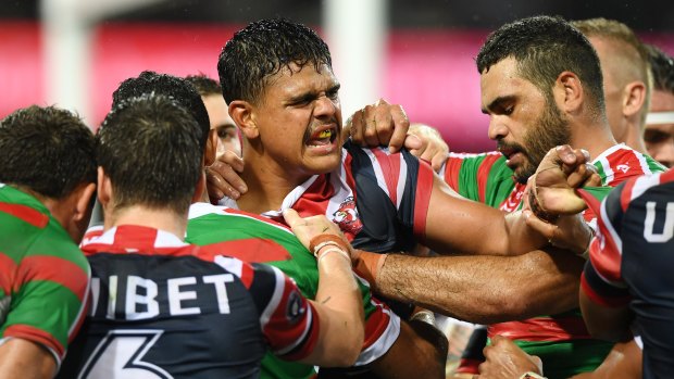 Spite night: Latrell Mitchell (centre) was never far from the action when tempers frayed on Friday night.