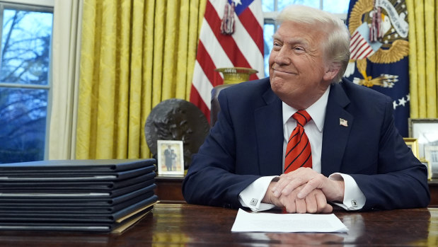 US President Donald Trump signed a series of executive orders in the Oval Office on Monday, Tuesday Australian time.