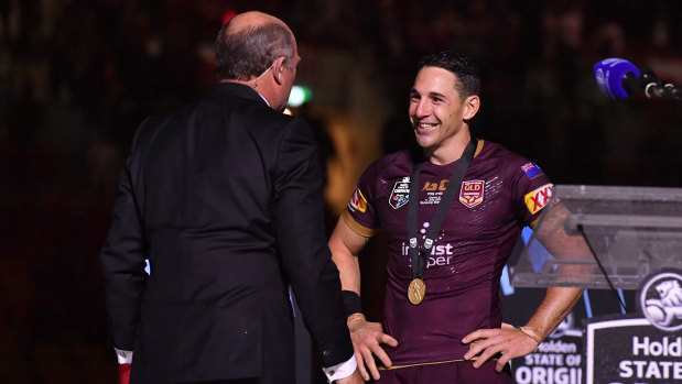 Controversial choice: Wally Lewis presents Billy Slater with the player-of-the-series medal.