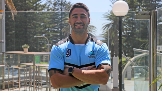 Shaun Johnson poses in his new colours after signing with Cronulla Sharks.