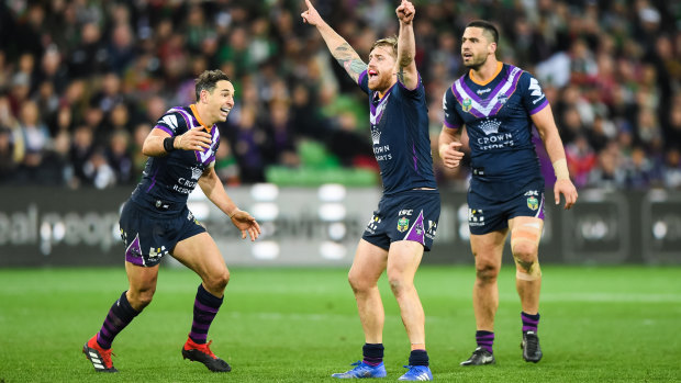 Making a point: Cameron Munster reacts after sealing victory for the storm with a field goal. 