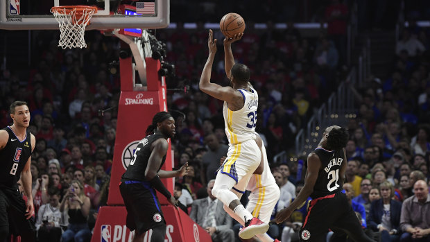 Golden State Warriors forward Kevin Durant shoots against the LA Clippers.