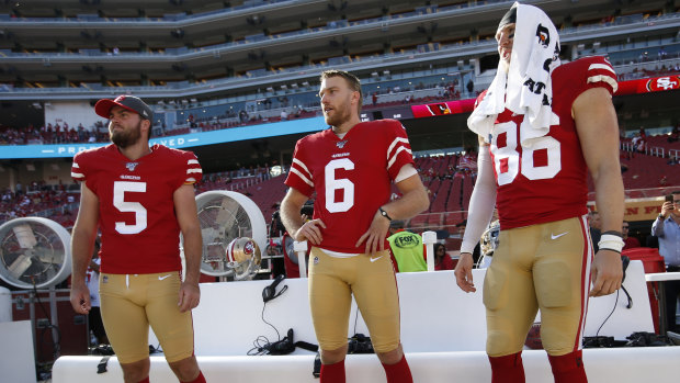 Mitch Wishnowsky, centre, from Perth is playing in the Super Bowl. 