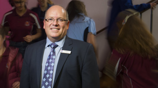 Principal Rob Emanuel at recess in the busy Lyneham High School.