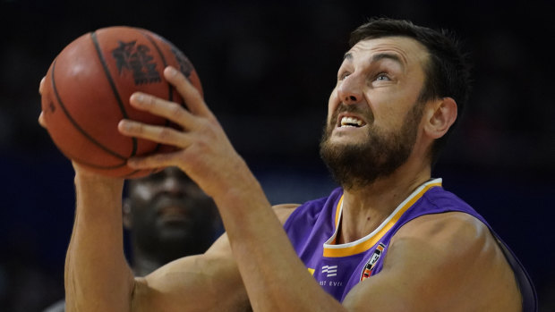 Andrew Bogut shoots for the basket during the victory over the Cairns Taipans at Qudos Bank Arena.