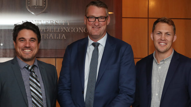 Respected former Wallaby Justin Harrison, centre, is believed to have reached the final stages of the selection process to lead the Rugby Union Players' Association. 
