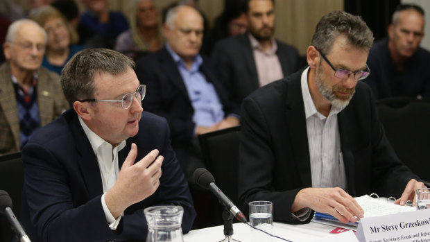 Defence officials Chris Birrer and Steve Grzeskowiak are grilled at a parliamentary inquiry into PFAS contamination in Williamtown, north of Newcastle. 