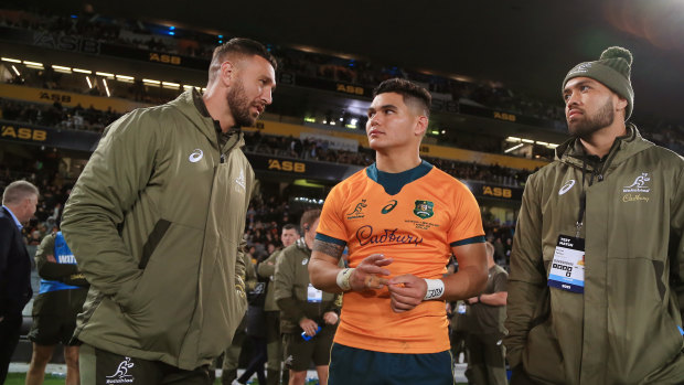 Quade Cooper chats to Lolesio after the match. 