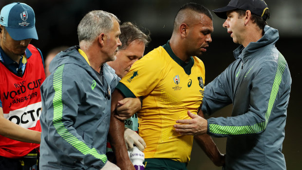 Kurtley Beale is helped off the field early in the Wallabies' clash with Georgia on Friday night.