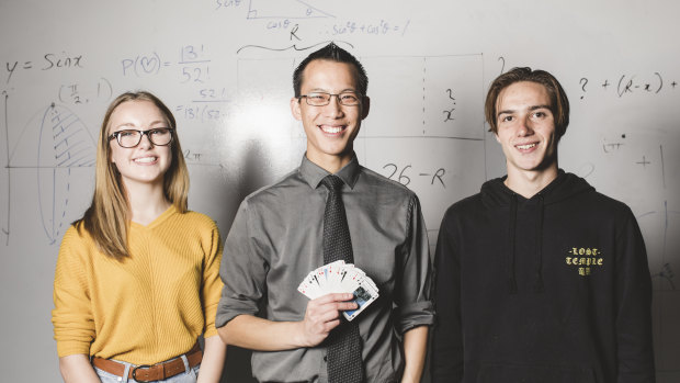 Eddie Woo (centre) made a special visit to a group of Hawker College students, including Diana Morton, 16 (left), and Hulieo Anderson, 17 (right).