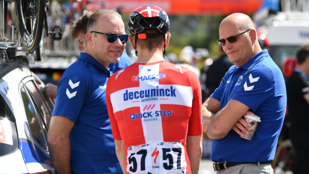 Team NTT co-owner Bjarne Riis (right) with sports director Lars Michaelsen (left) and Danish rider Michael Morkov.