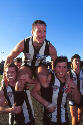 Second chance: Craig Kelly and his Magpies of 1990 were unable to deliver back-to-back flags; the team he oversees as club CEO now has that chance.