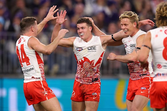 Tom Hanily of the Swans celebrates a goal