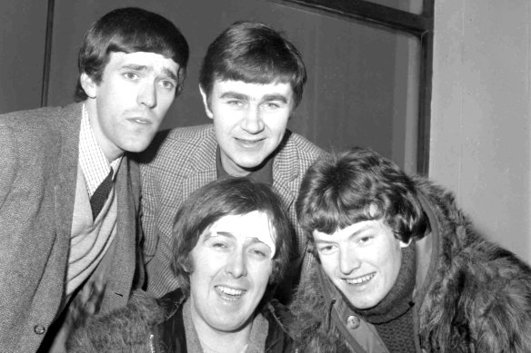 In this 1966 file photo, members of the band, the Spencer Davis Group, from top left: Muff Winwood, Pete York and Steve Winwood and Spencer Davis, foreground.