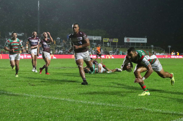 Alex Johnston dives for the try line at Brookvale.