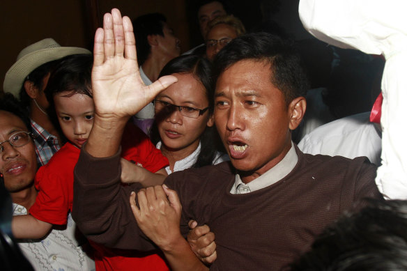 Pro-democracy activist Kyaw Min Yu, pictured in Yangon in 2012 with his wife and daughter after being released from prison, was also executed. 