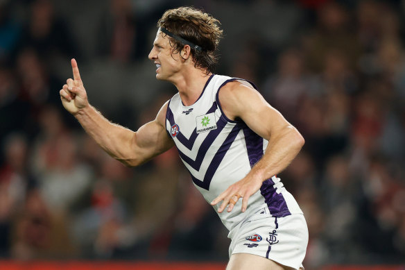 Fremantle star Nat Fyfe celebrates a goal.