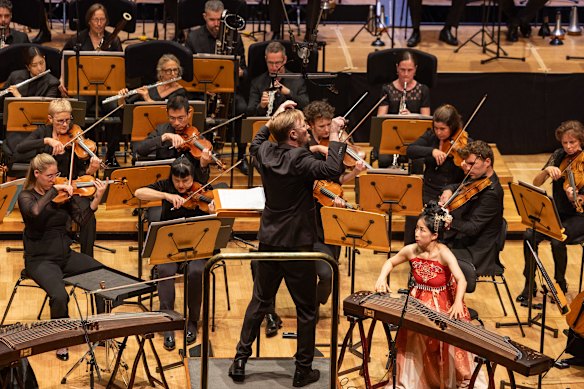 Soloist Mindy Meng Wang plays the world premiere of Jessica Wells’ Concerto for Guzheng and Orchestra.