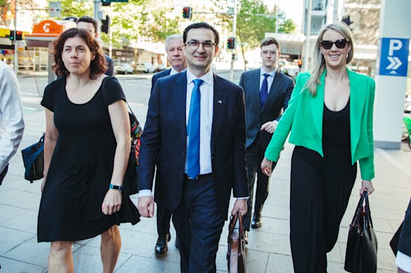 Barrister Sue Chrysanthou, SC (left), surgeon Munjed Al Muderis and his partner, Claudia Roberts, in September 2023.
