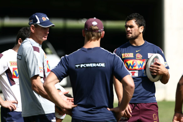 Karmichael Hunt listened to coach Wayne Bennett during Broncos practice at Red Hill in 2008.