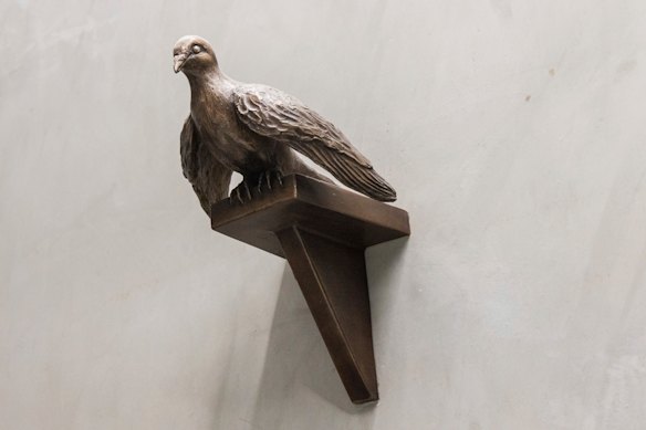A bronze carrier pigeon by artist Fiona Hall at Anzac Station.