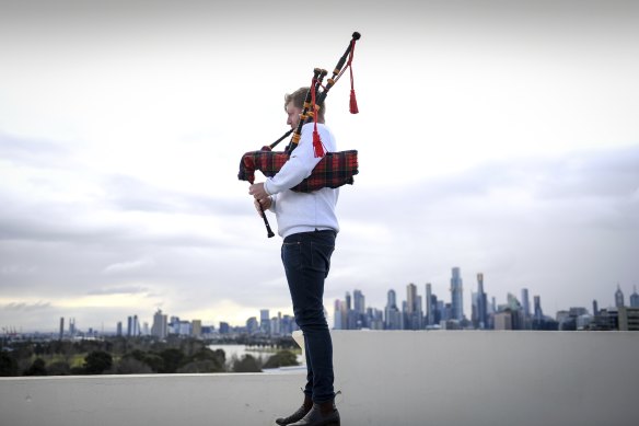 Marcus Willson’s bagpipes ring out across St Kilda.