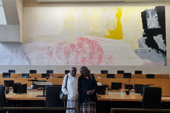 Amanda and Dorothy Gabori in front of their mother’s mural at the Supreme Court in Brisbane.  