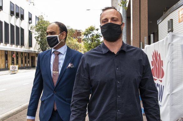 Mitchell Cole (right) leaves Parramatta Local Court after narrowly avoiding jail on Tuesday. 