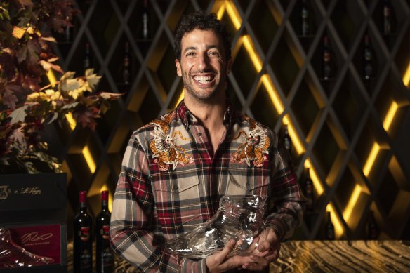 Daniel Ricciardo spruiks his commercial deal with St Hugo wines at the W Hotel in Melbourne on Monday. The F1 driver says he prefers red wine over the traditional F1 champagne.