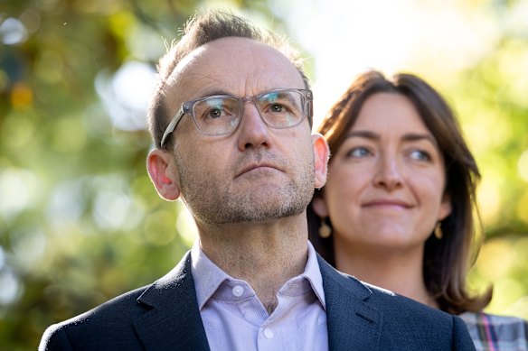 Greens leader Adam Bandt with Senator Steph Hodgins-May in Melbourne’s Treasury Gardens on Monday.