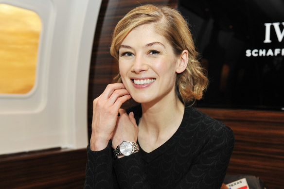 Actor Rosamund Pike displaying an IWC Mark XV Spitfire “men’s” watch.