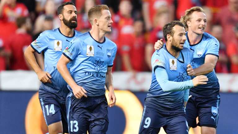 All tied up: Adam Le Fondre, second from right, celebrates with Rhyan Grant after levelling the scores.