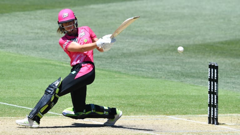 Solid total: Erin Burns of the Sydney Sixers hits out at Adelaide Oval.