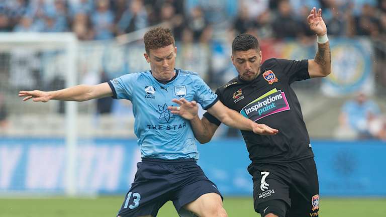 Tussle: Brandon O'Neill challenges the Jets' Dimitri Petratos for the ball at Jubilee Stadium.