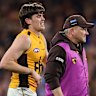 Will Day hobbles off Adelaide Oval.