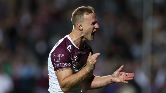 Daly Cherry-Evans celebrates after scoring.