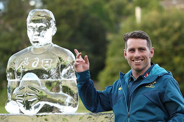 Bernard Foley with an 'Iceman' sculpture made in his honour.