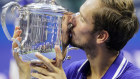 Daniil Medvedev, of Russia, kisses the championship trophy after defeating Novak Djokovic in the men’s singles final of the US Open. 