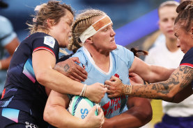 Emily Robinson carting the ball up for the Waratahs.